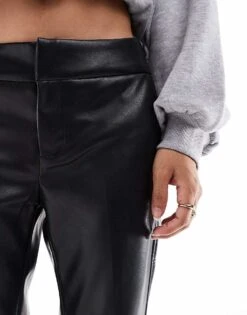 Bershka Petite Faux Leather Flared Trousers In Black For Women -Chic Maze Sales 207625811 5