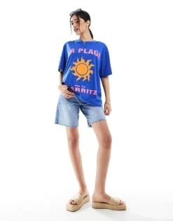 Bershka High Waisted Raw Hem Longline Denim Shorts In Mid Blue For Women