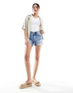Bershka High Waisted Ripped Denim Shorts In Mid Blue For Women